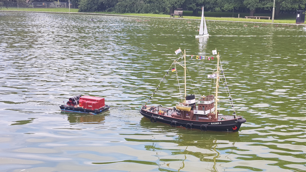 Bugsier 3 towing small barge